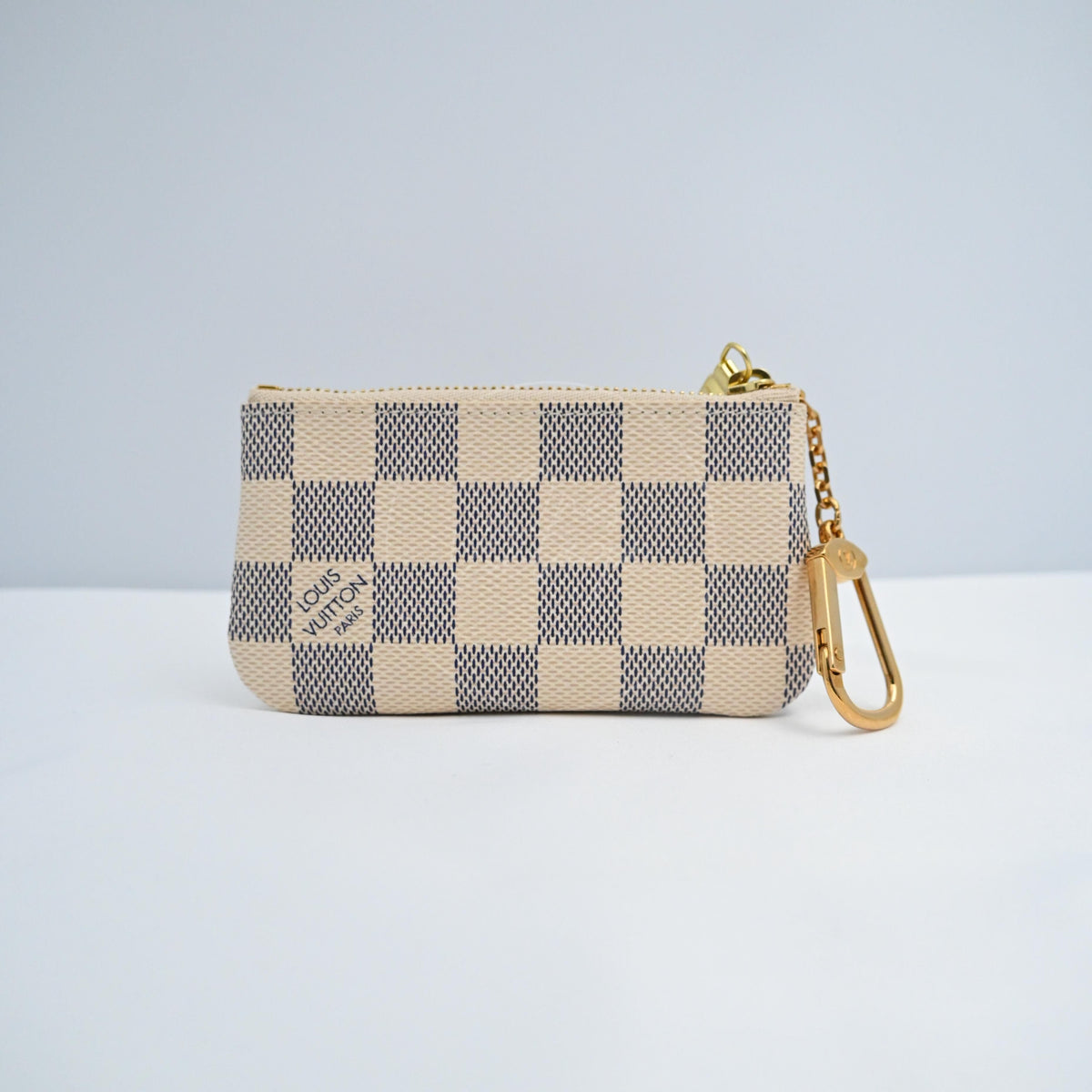 Louis Vuitton N62659 Pochette Cle Key Pouch Coin Purse in damier azur, featuring top zipper closure and checkerboard canvas pattern, front view