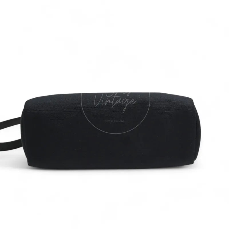 Hermès Herbag Zip 31 Canvas in black toile canvas and swift, featuring rounded rectangular silhouette and textured black exterior, front view