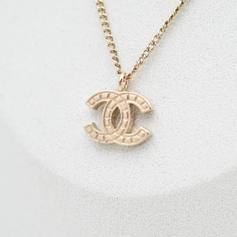 Chanel CC Clip-on Necklace, pendant with interlocking CC motif and curved bar detailing