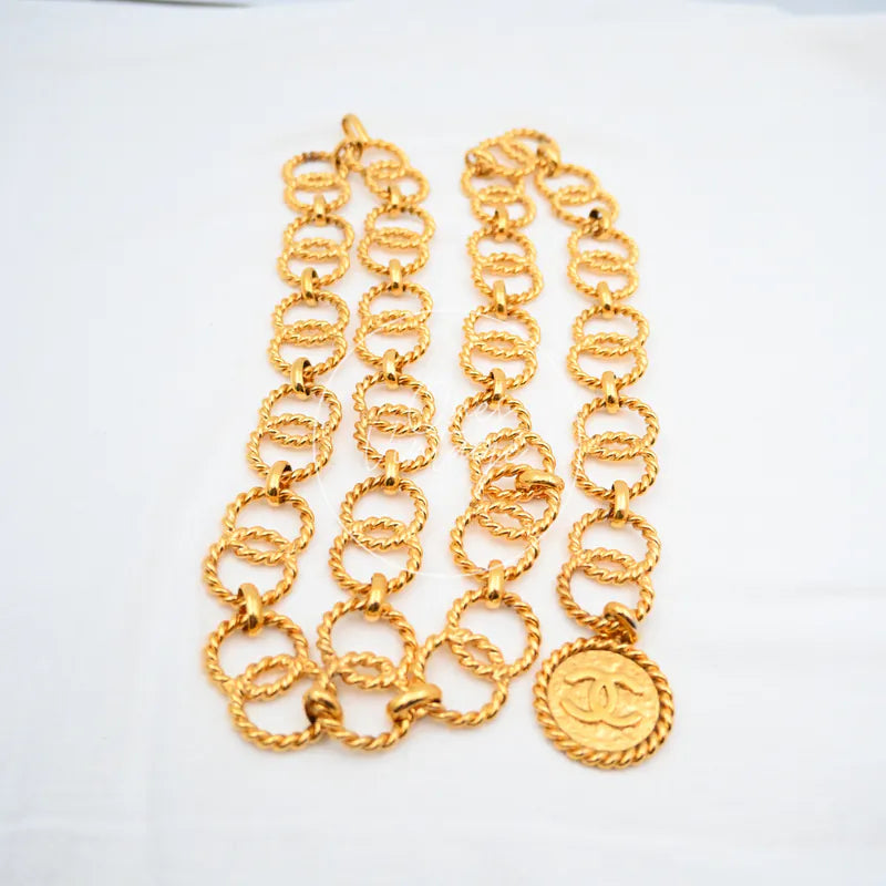 Chanel Chain Loop Medallion Waist Belt in gold-plated, featuring repeating chain links and round medallion, front view