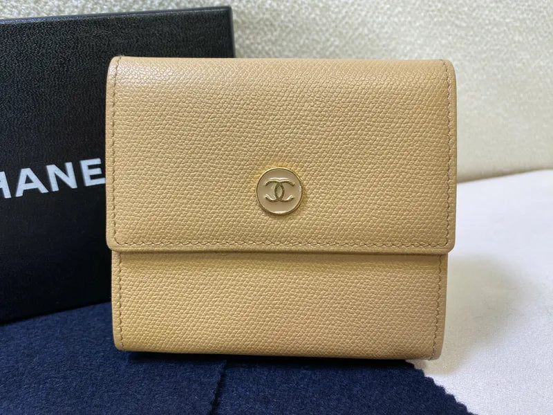 Chanel CC Logo Compact Trifold Wallet in beige calfskin, featuring circular CC logo closure and textured leather exterior, front view