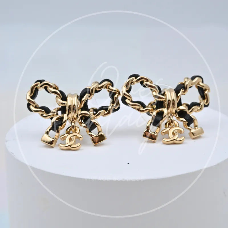 Chanel Classic Chain Ribbon with CC Mark Pendant Stud Earrings in 18K gold-plated alloy metal and lambskin, front view
