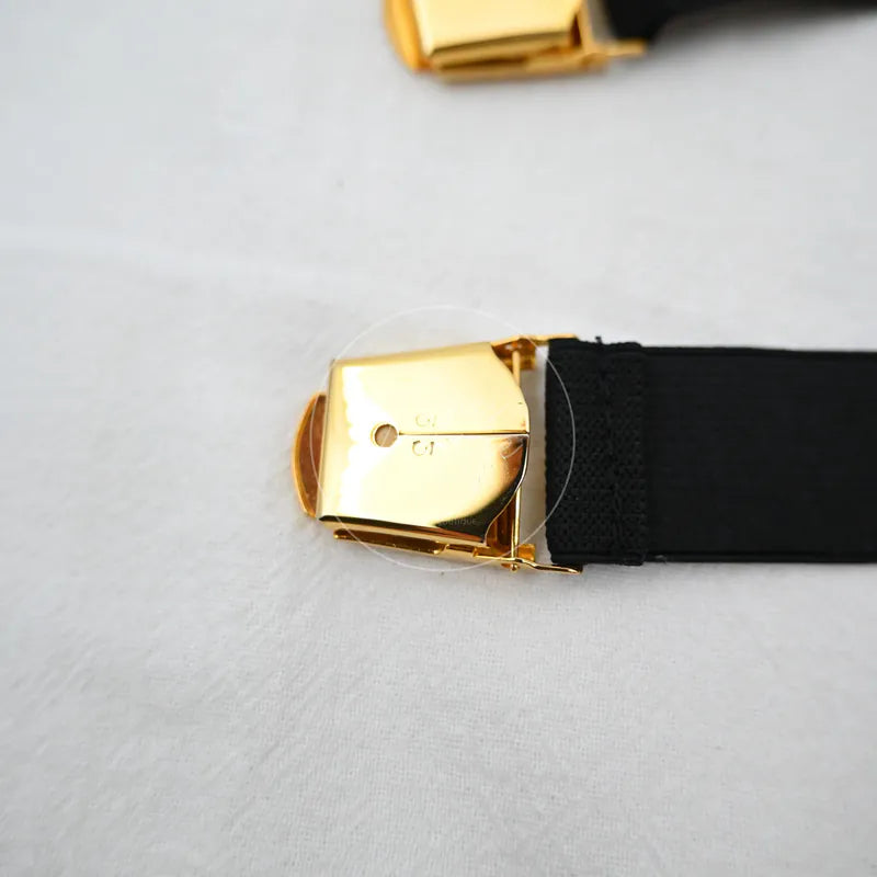 Chanel Logo-jacquard Armbands, black woven band and gold-tone rectangular buckle detail
