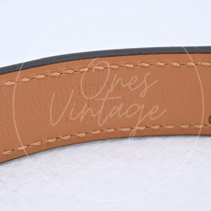 Hermès Kelly Belt epsom leather, stitching with curved leather strap and black edge finish detail