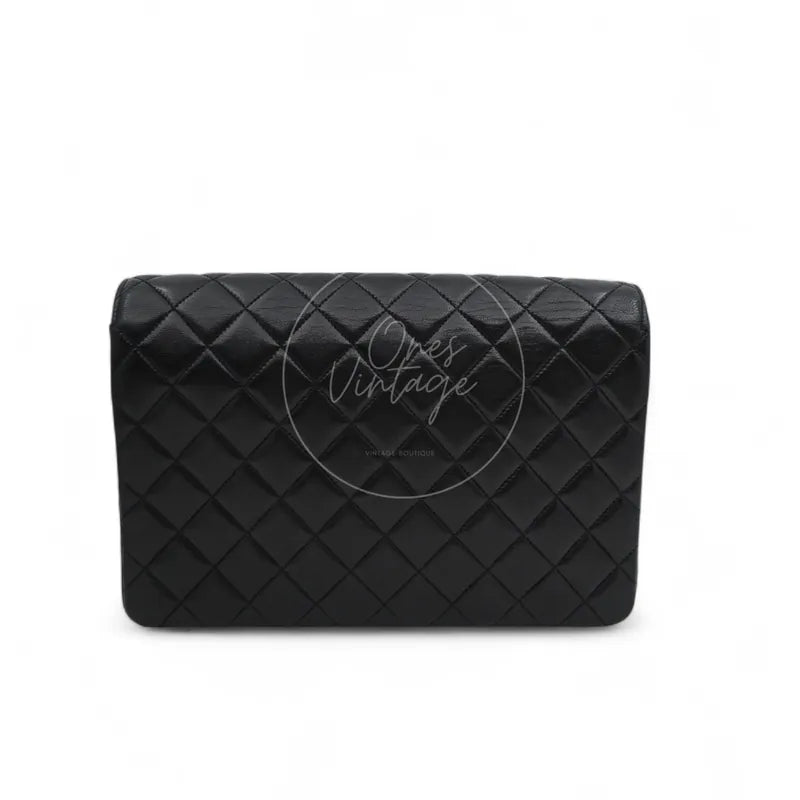 Chanel Vintage Circle CC Mark Single Flap Shoulder Bag in black lambskin, featuring rounded rectangular silhouette and single flap design, front view