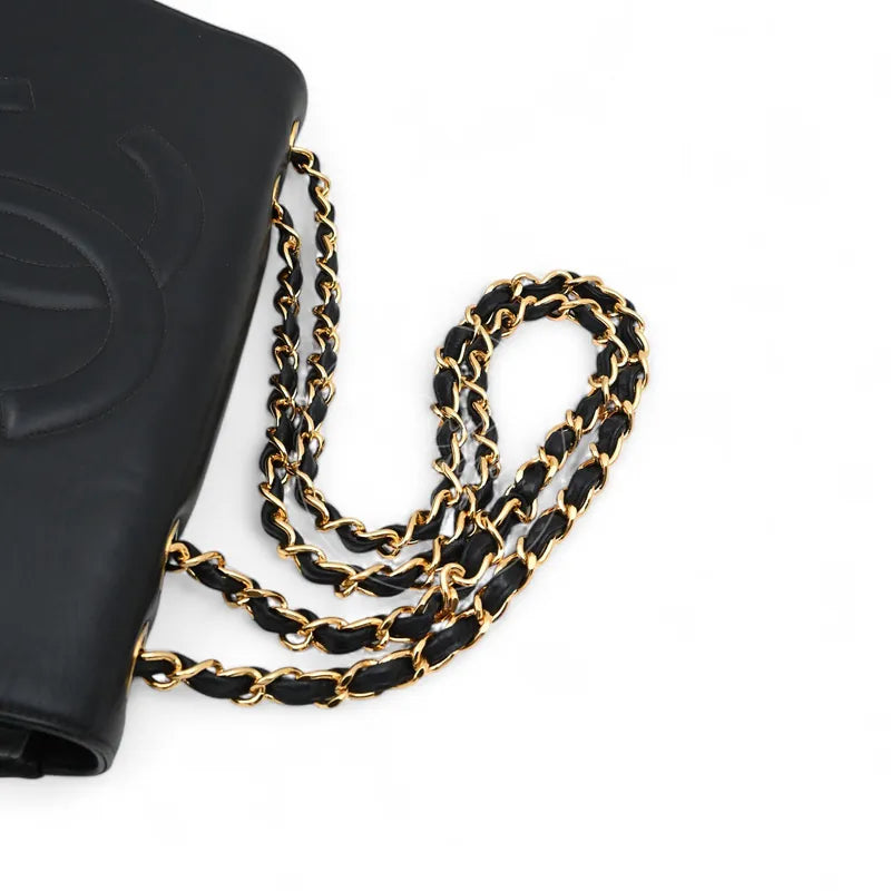 Chanel Vintage Maxi CC Straight Flap Bag, interwoven chain strap and gold-tone chain links detail