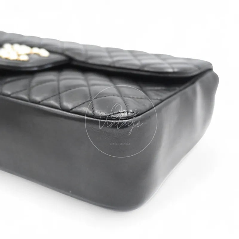 Chanel Westminster Pearl Medium Classic Flap Bag With Pearl Chain lambskin, rounded lower corner and smooth leather side panel detail