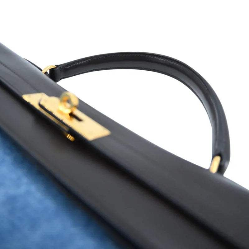 Hermès Kelly 35 x Stamp brown and, visible turn-lock hardware and arched leather top handle detail