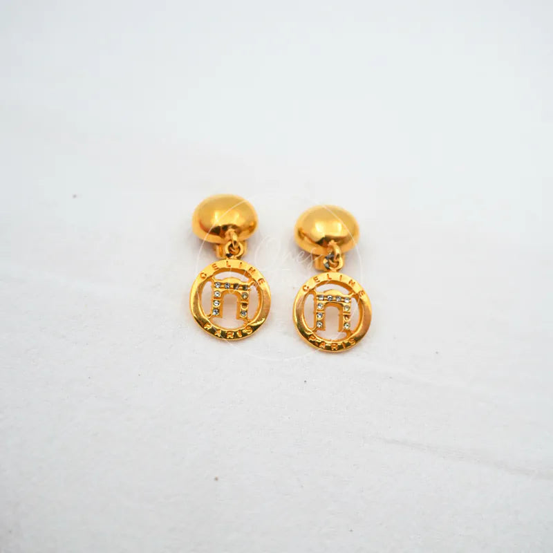 Celine Vintage Earrings in gold plate, featuring matching drop earrings and round medallion charms, front view