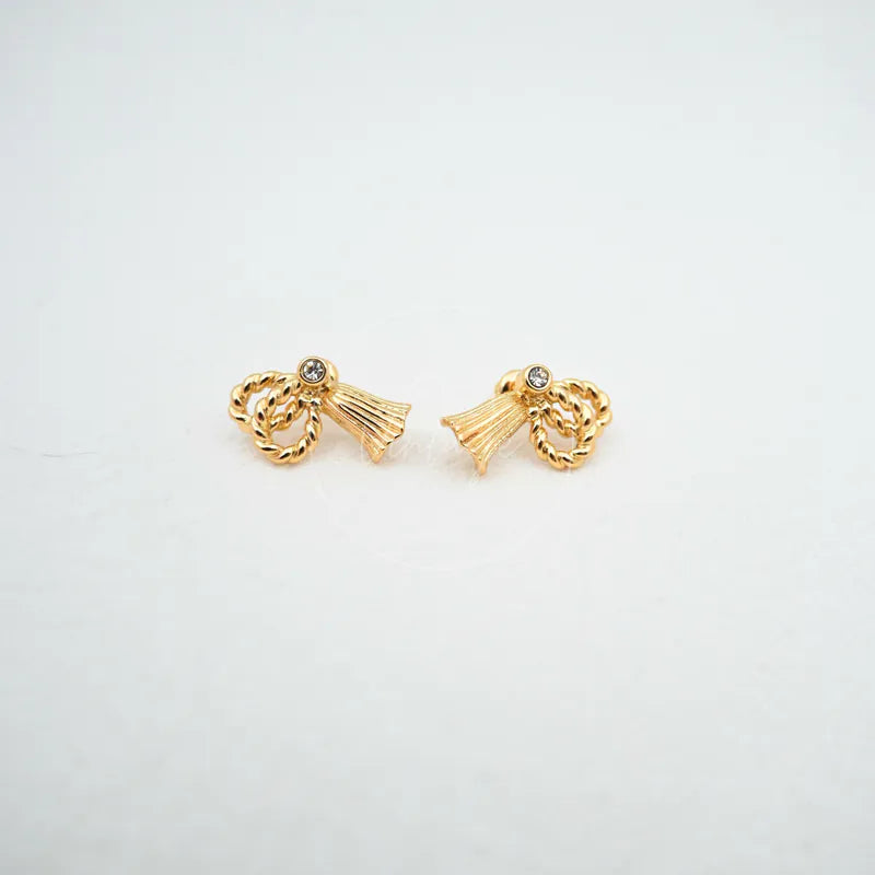 Dior Pierced Earrings in gold plate, featuring paired loop-and-tassel design and small round stones, front view