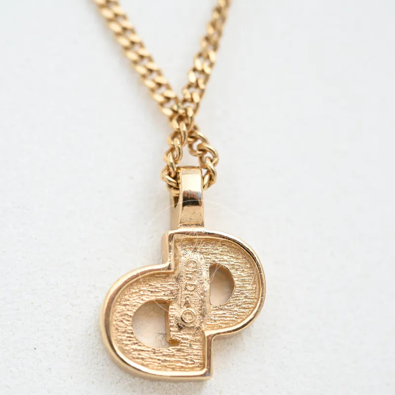 Dior Rhinestone-embellished CD logo Necklace, pendant with interlocking CD motif and textured metal surface detail