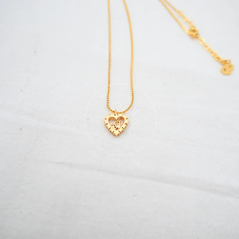 Dior Logo-heart Pendant Necklace, heart-shaped pendant and central circular cutout detail