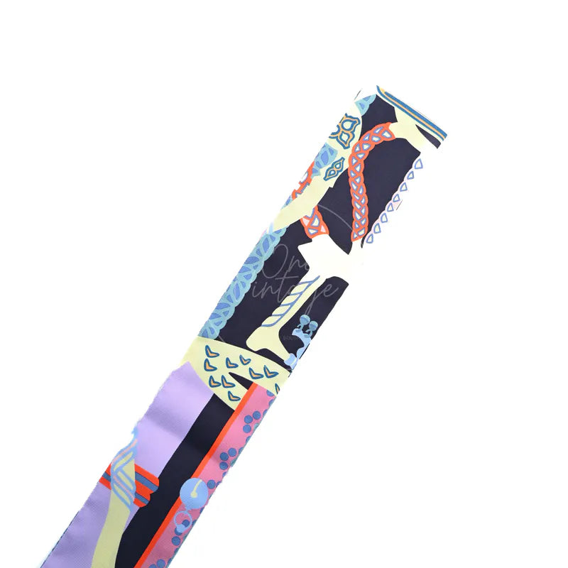 Hermès Fantaisie d'Etriers Twilly, multicolour equestrian-inspired print and contrasting striped edge detail