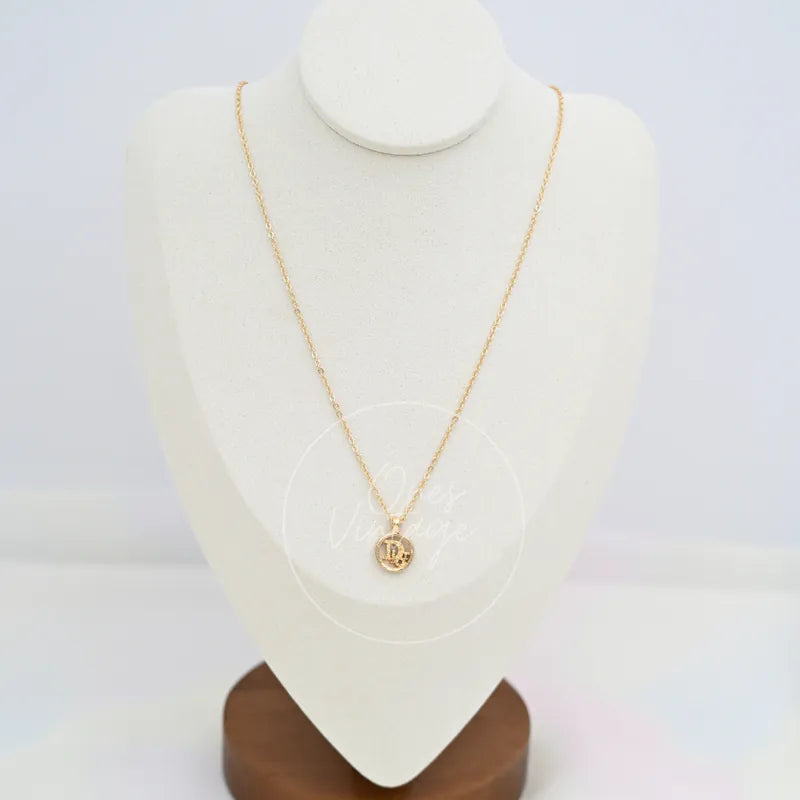 Dior Necklace Plated CD Logo in gold-plated, featuring fine chain and round CD logo pendant, front view