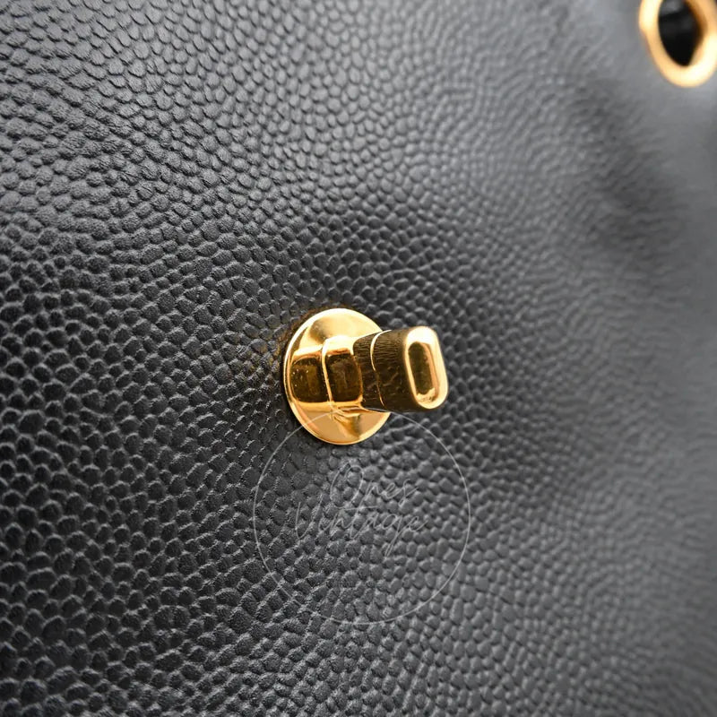 Chanel Supermodel Vintage Tote Bag with gold-tone hardware, gold-tone turn-lock hardware and pebbled leather texture detail