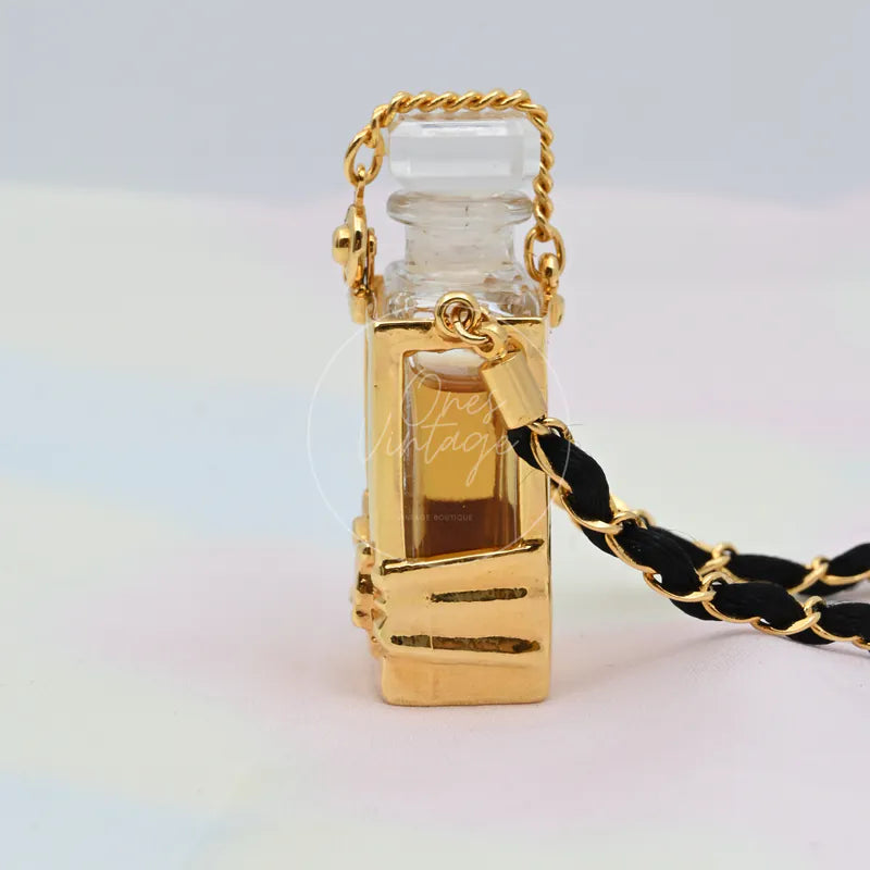 Chanel Perfume Eau De Parum No.5 24K Plated Necklace, perfume bottle-shaped pendant and rectangular inset panel detail