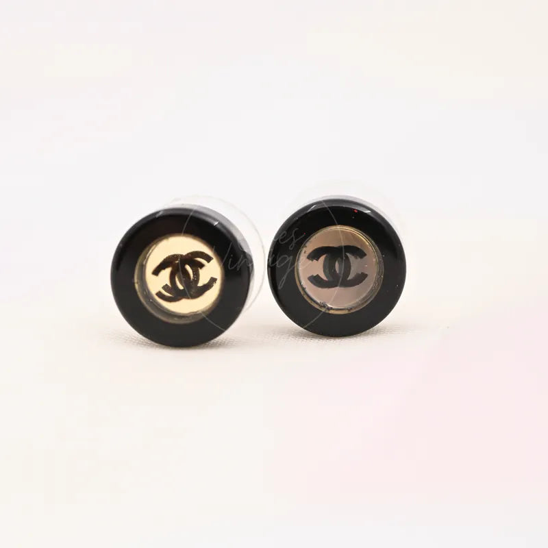 Chanel CC Mark Logo Black Button Stud Earrings in resin and metal, featuring interlocking logo centers and round black button studs, front view
