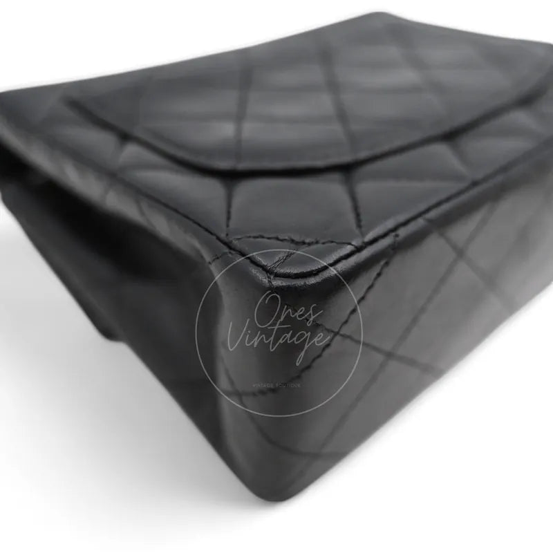 Chanel Vintage Mini Square Single Flap Bag lambskin, bag corner with curved flap seam and diamond quilting detail