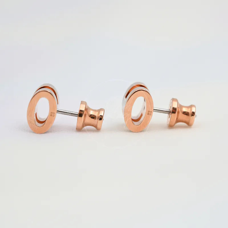 Hermès Mini Pop H Earrings Grey With Pink Gold in gold-plated alloy metal, featuring push-back closures and round stud earrings, back view