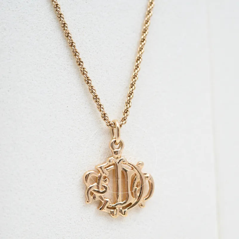 Dior Vintage Necklace, ornate monogram-style pendant and textured chain detail