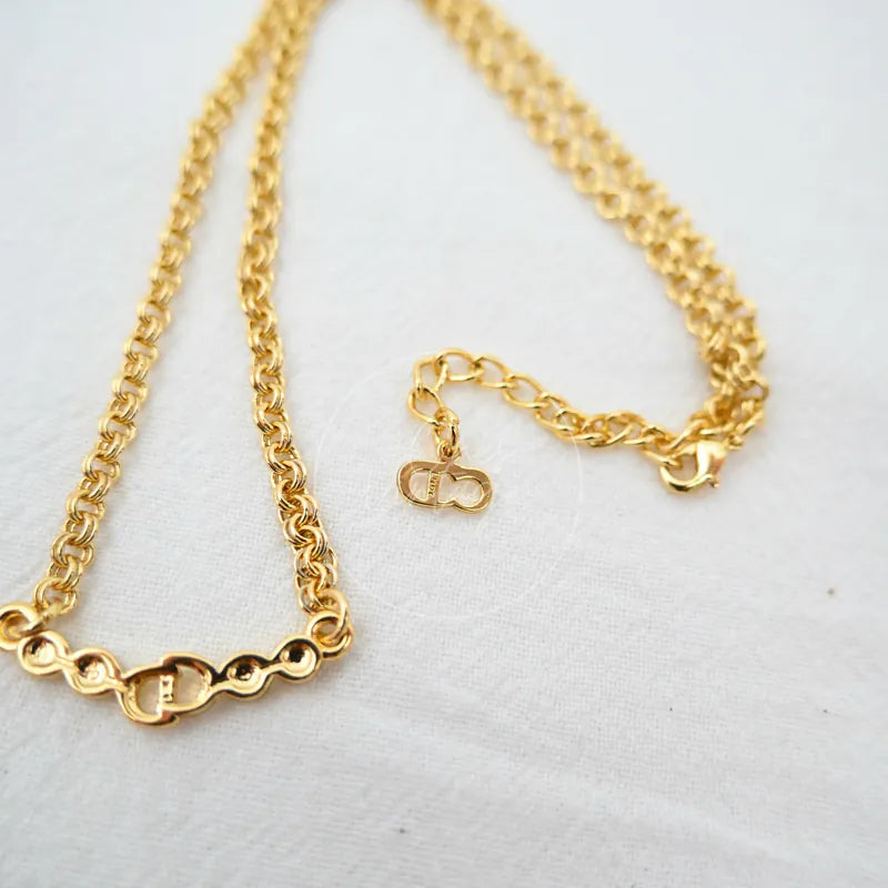 Dior CD Logo Necklace in alloy metal and rhinestone, featuring interlocking logo pendant and lobster clasp, front view