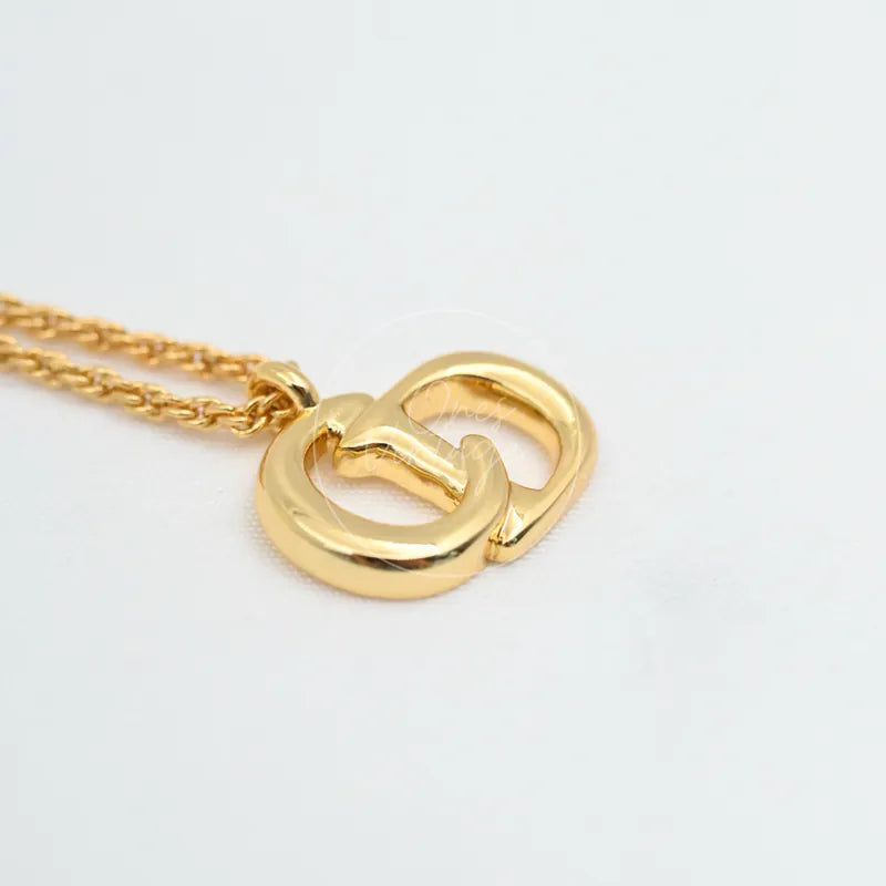 Dior CD Logo Necklace, interlocking CD logo pendant and fine link chain detail