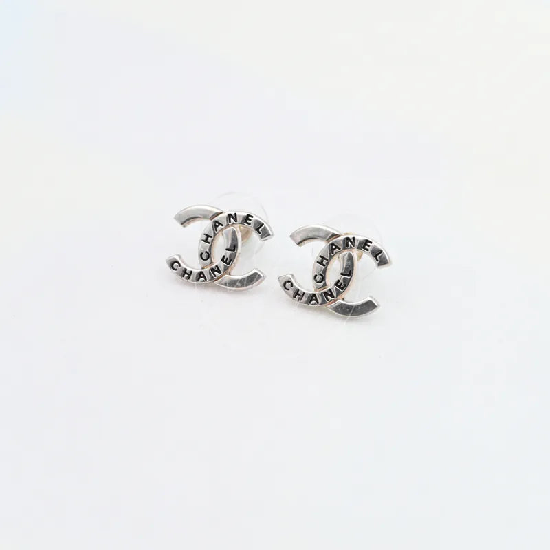 Chanel CC Mark With Black Front Stud Earrings in silver-plated metal, featuring interlocking CC motifs and black front inserts, front view
