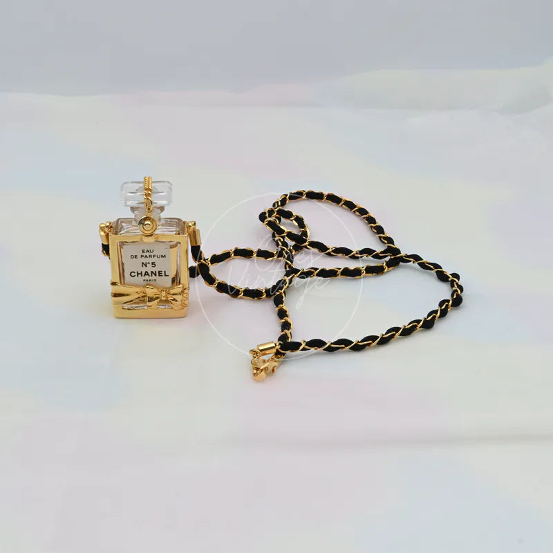Chanel Perfume Eau De Parum No.5 24K Plated Necklace in 24K gold plated, featuring lobster clasp and perfume bottle-shaped pendant, front view