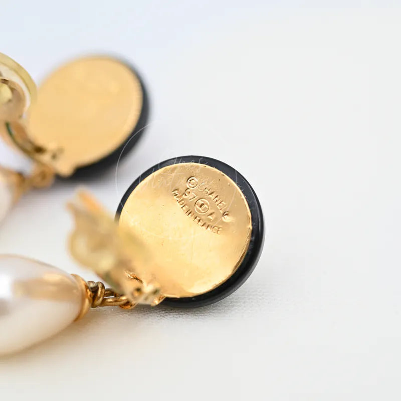 Chanel Teardrop Pearl CC Dangle Earrings, engraving detail