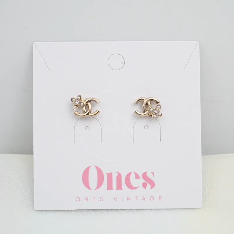 Chanel CC Lucky Clover Earrings in gold-plated alloy metal, pearl and crystal, featuring paired CC-shaped earrings, front view