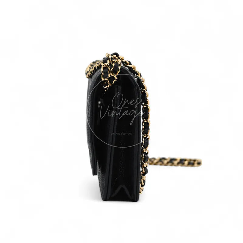 Chanel Wallet on Chain in black quilted caviar leather with gold hardware, Series 22, right side profile