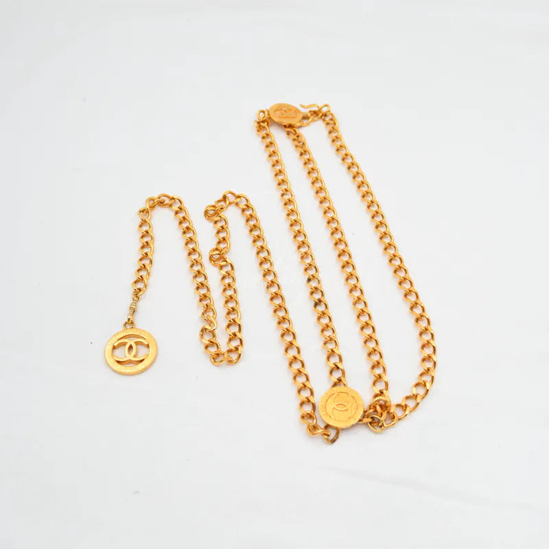 Chanel Chain CC Medallion Belt in gold plated, featuring interlocking CC medallion and round medallion, front view