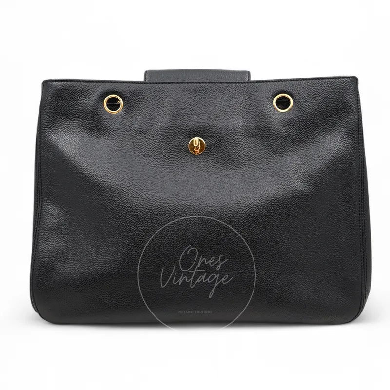 Chanel Supermodel Vintage Tote Bag in black caviar with gold-tone hardware, featuring central turn-lock closure and gold-tone grommets, front view
