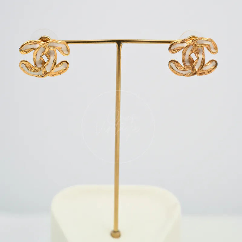 Chanel CC Logo Earrings in gold-plated, featuring interlocking CC motifs and textured finish, front view