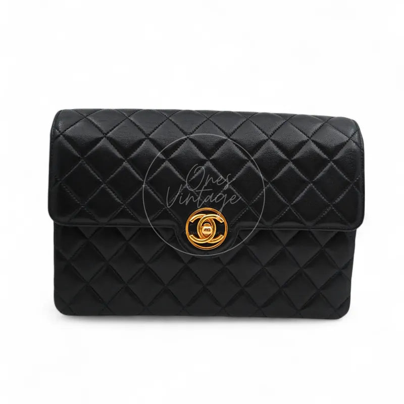 Chanel Vintage Classic Flap bag in black lambskin with gold-tone round CC turn-lock front view