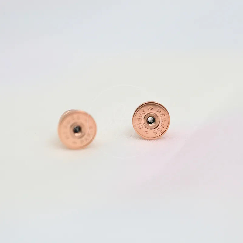 Hermès Mini Pop H Earrings Grey With Pink Gold in gold-plated alloy metal, featuring circular earring backs and central post openings, back view