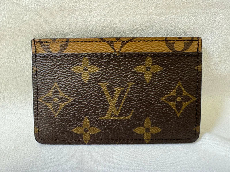Louis Vuitton M61733 Card Holder in monogram, featuring Monogram canvas exterior and Card slot opening, front view