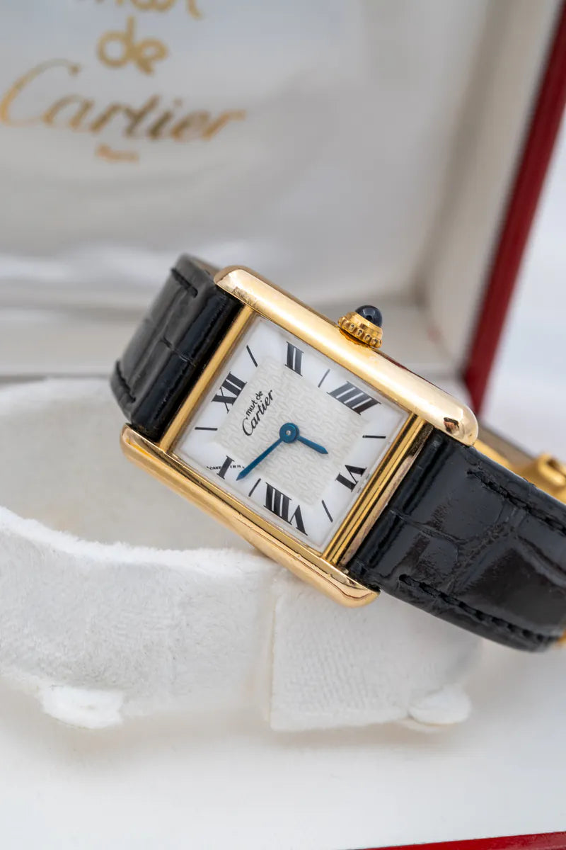 Cartier W1003154 1613 Vermeil Tank Vintage 20mm quartz watch, featuring rectangular white dial and Roman numeral hour markers, front view