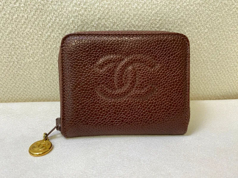 Chanel Vintage CC Mark Zip Wallet Caviar in red caviar leather, featuring interlocking CC logo and pebbled leather texture, front view