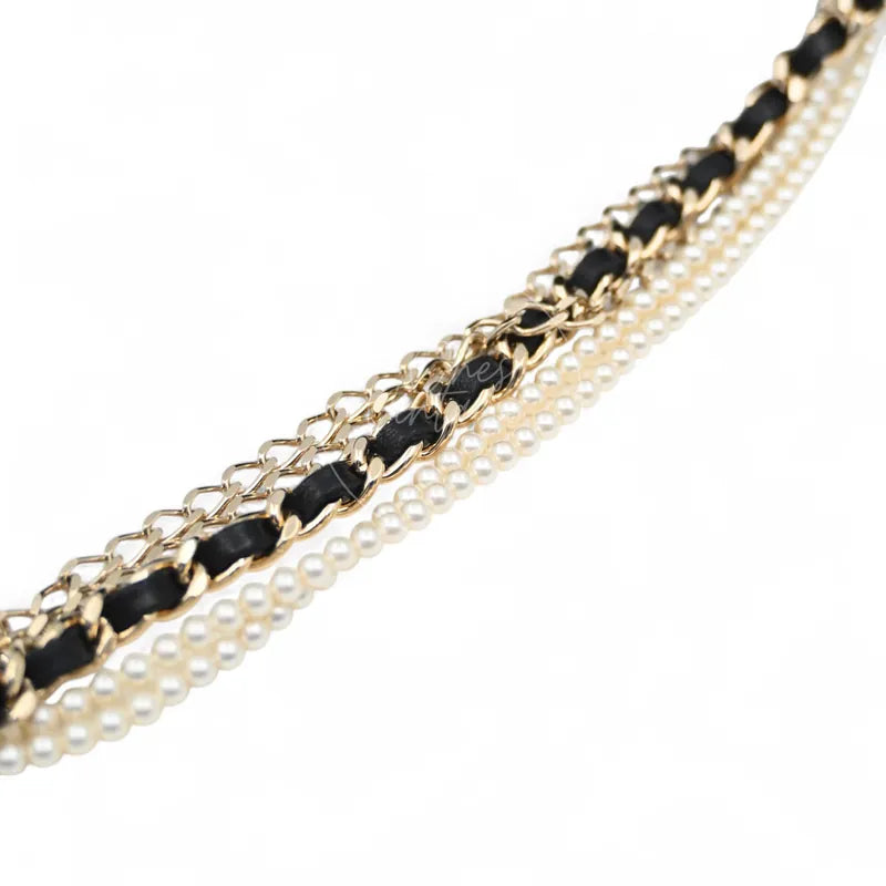 Chanel Westminster Pearl Medium Classic Flap Bag With Pearl Chain, black leather-woven chain and pearl-trimmed chain strap detail
