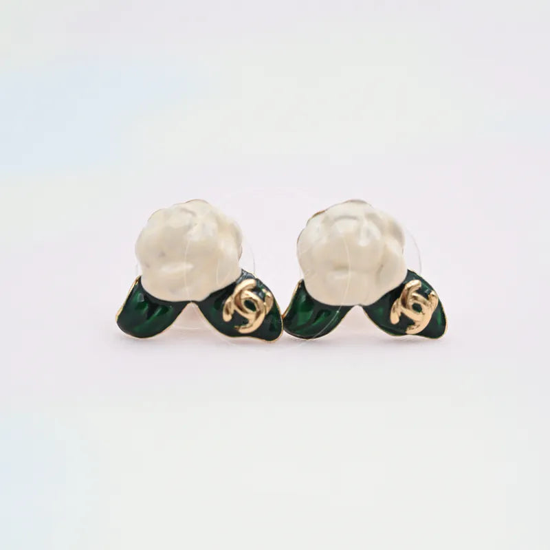Chanel Camellia Baramotif Stud Earrings in gold-plated metal and enamel, featuring paired floral stud earrings, front view