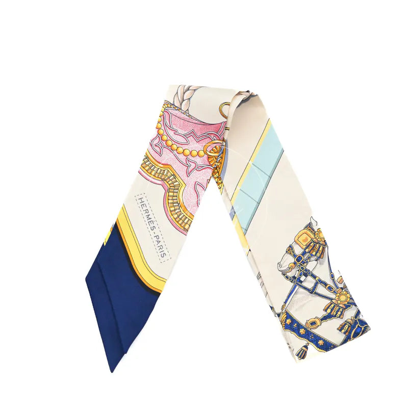Hermès Grand Apparat Twilly in multicolour silk 100%, featuring Equestrian-themed printed motif and Narrow scarf silhouette, front view
