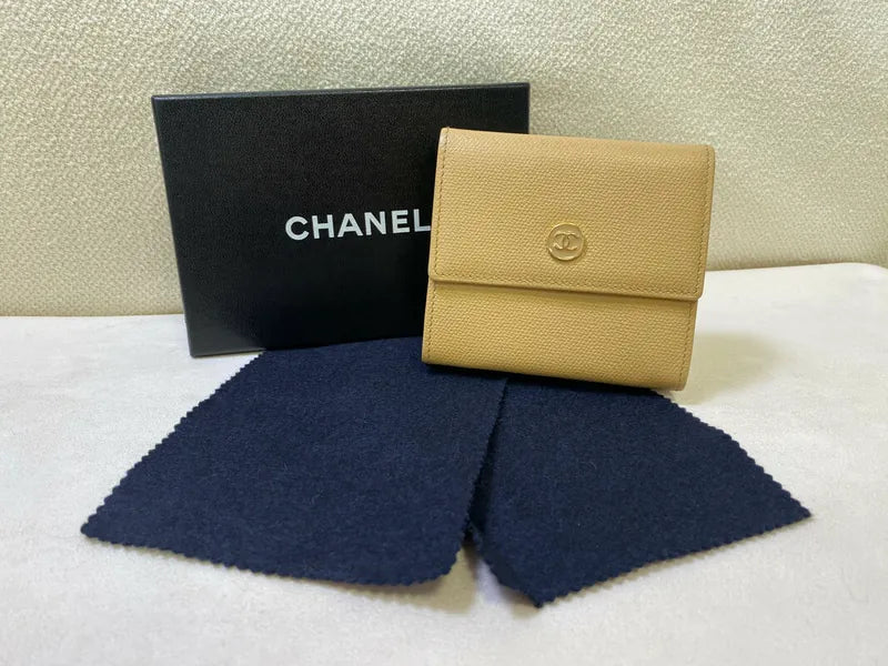 Chanel CC Logo Compact Trifold Wallet in beige calfskin, featuring fold-over closure and CC logo on flap, front view