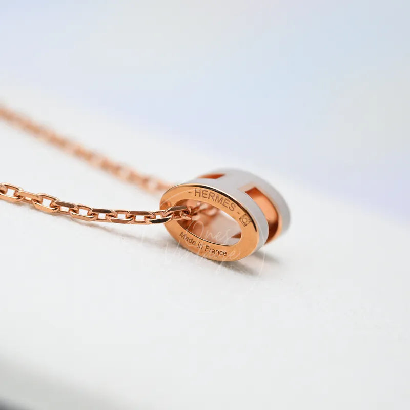 Hermès Grey Rose Gold Mini Pop H Necklace, engraving detail