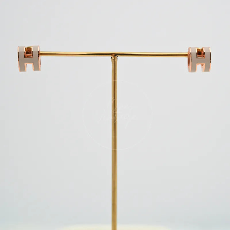 Hermès Mini Pop H Earrings Grey With Pink Gold in gold-plated alloy metal, featuring paired H-shaped earrings and stud-style earrings, front view
