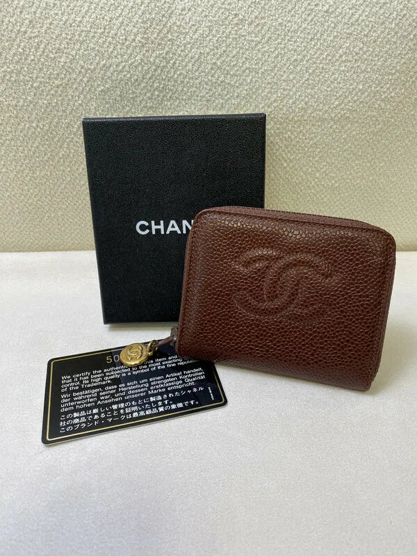 Chanel Vintage CC Mark Zip Wallet Caviar in red caviar leather, featuring interlocking CC logo and pebbled leather texture, front three-quarter view