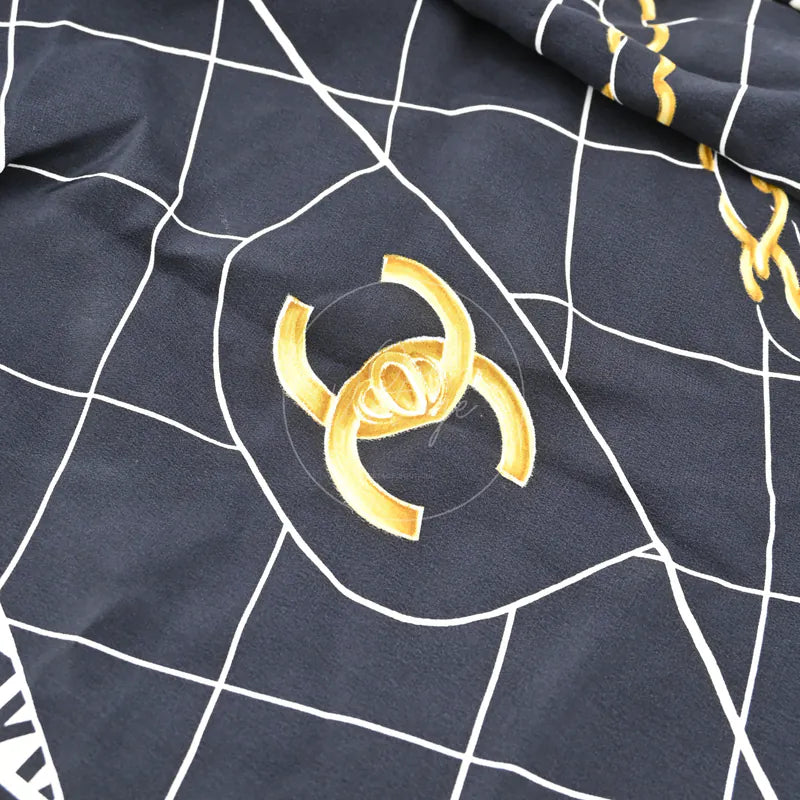 Chanel and Scarf, interlocking CC logo and white grid pattern detail