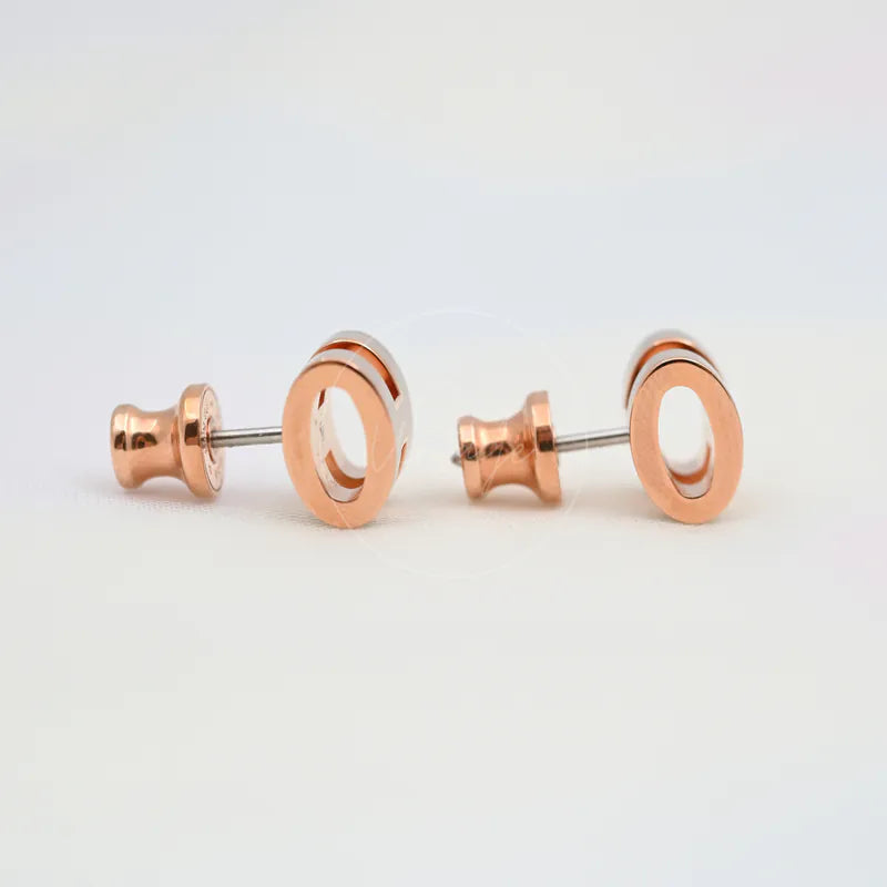 Hermès Mini Pop H Earrings Grey With Pink Gold in gold-plated alloy metal, featuring circular stud fronts and straight posts, back view