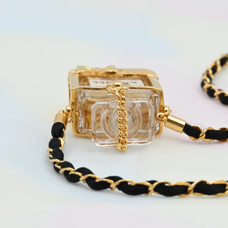 Chanel Perfume Eau De Parum No.5 24K Plated Necklace, clear rectangular perfume-bottle pendant and gold-tone frame and fittings detail