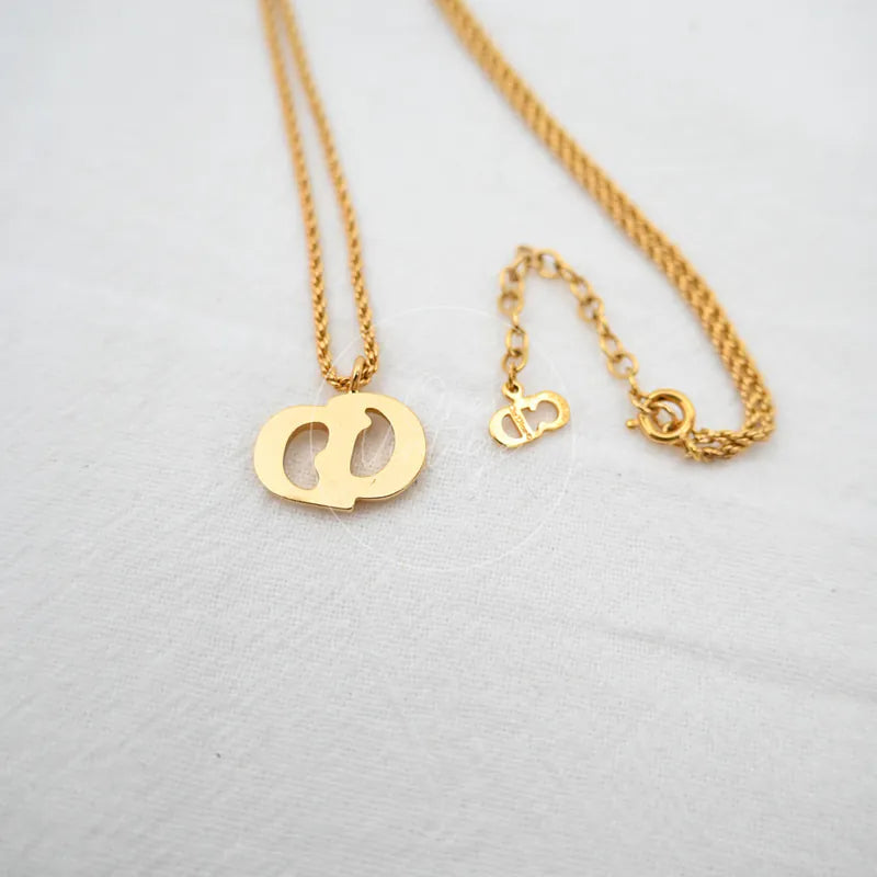 Dior CD Logo Necklace, interlocking CD logo pendant and lobster clasp detail